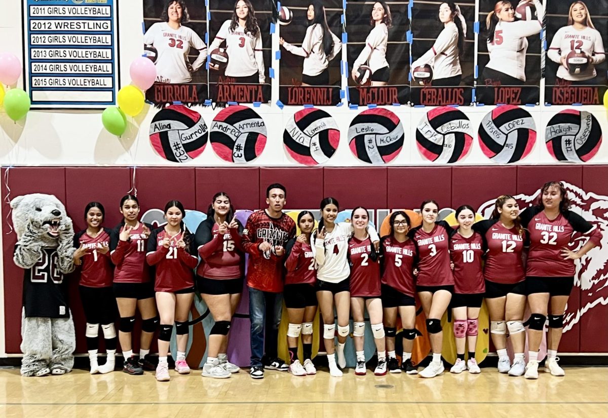 The Granite Hills volleyball team poses for a picture after beating Corcoran on Senior Night. 