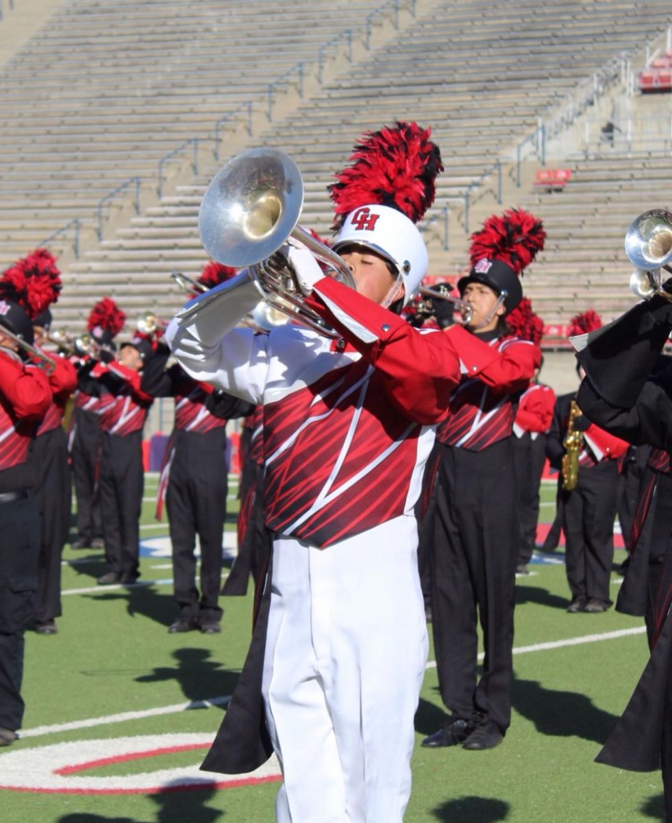 Jose Navarro plays his instrument at the Sierra Cup Classic at Fresno State.