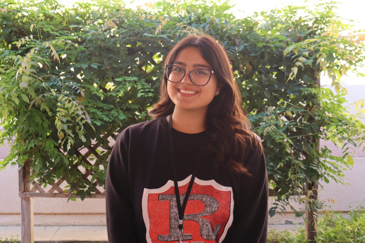 Alissa Villagomez poses for a photo after discussing her favorite Thanksgiving dish.
